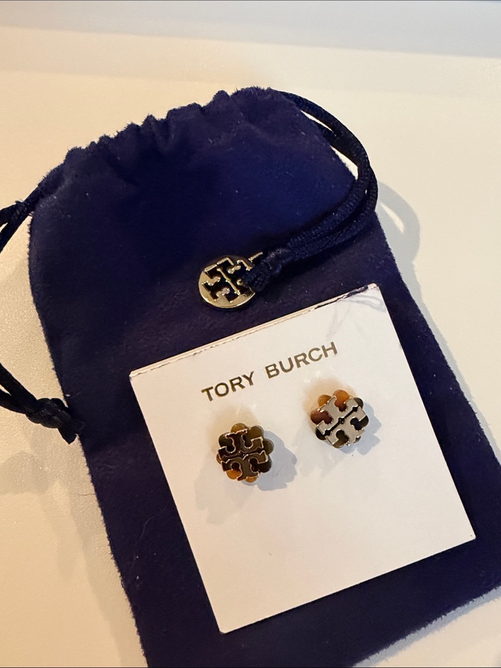 Tory Burch gold toned with brown trim earrings